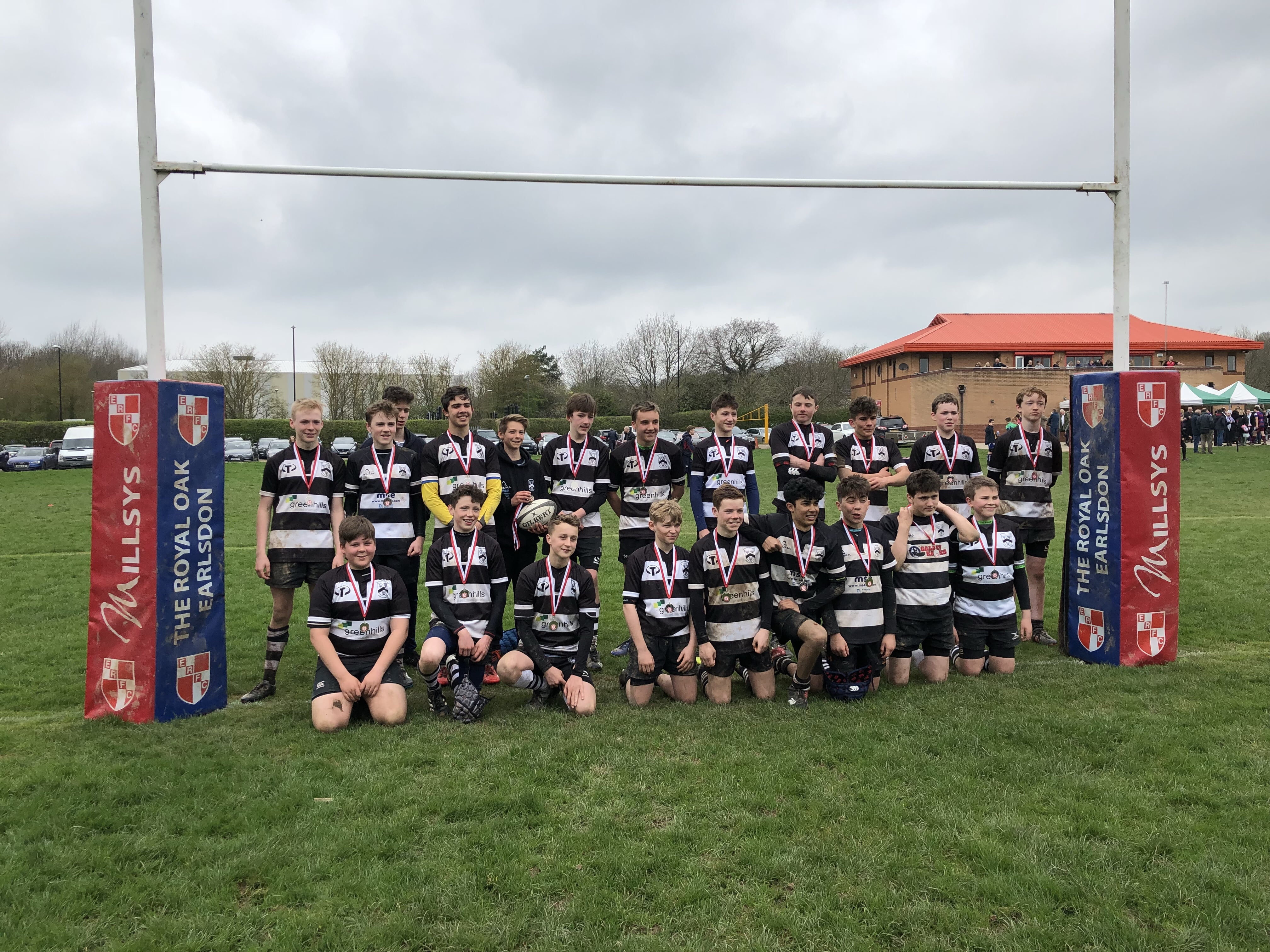 Rugby Team With Posts Behind Them