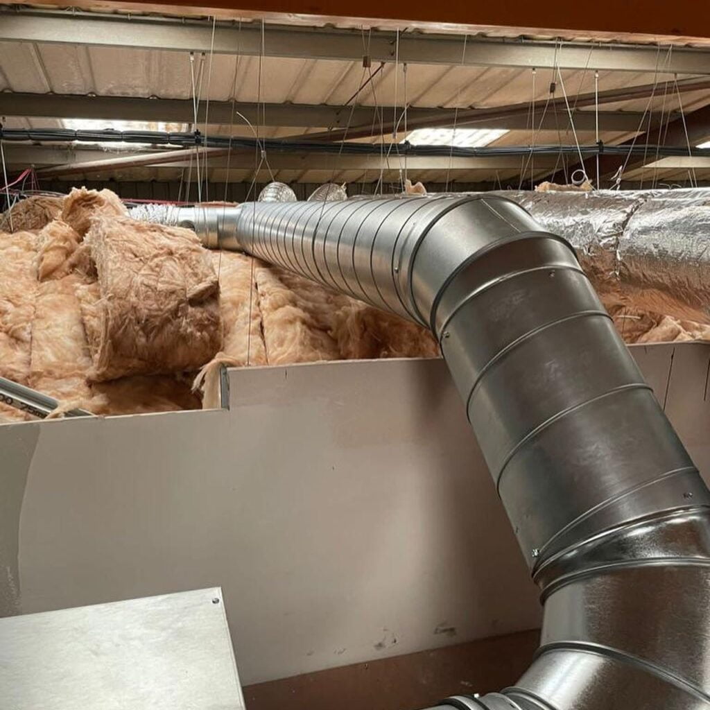 Air conditioning pipes in an attic