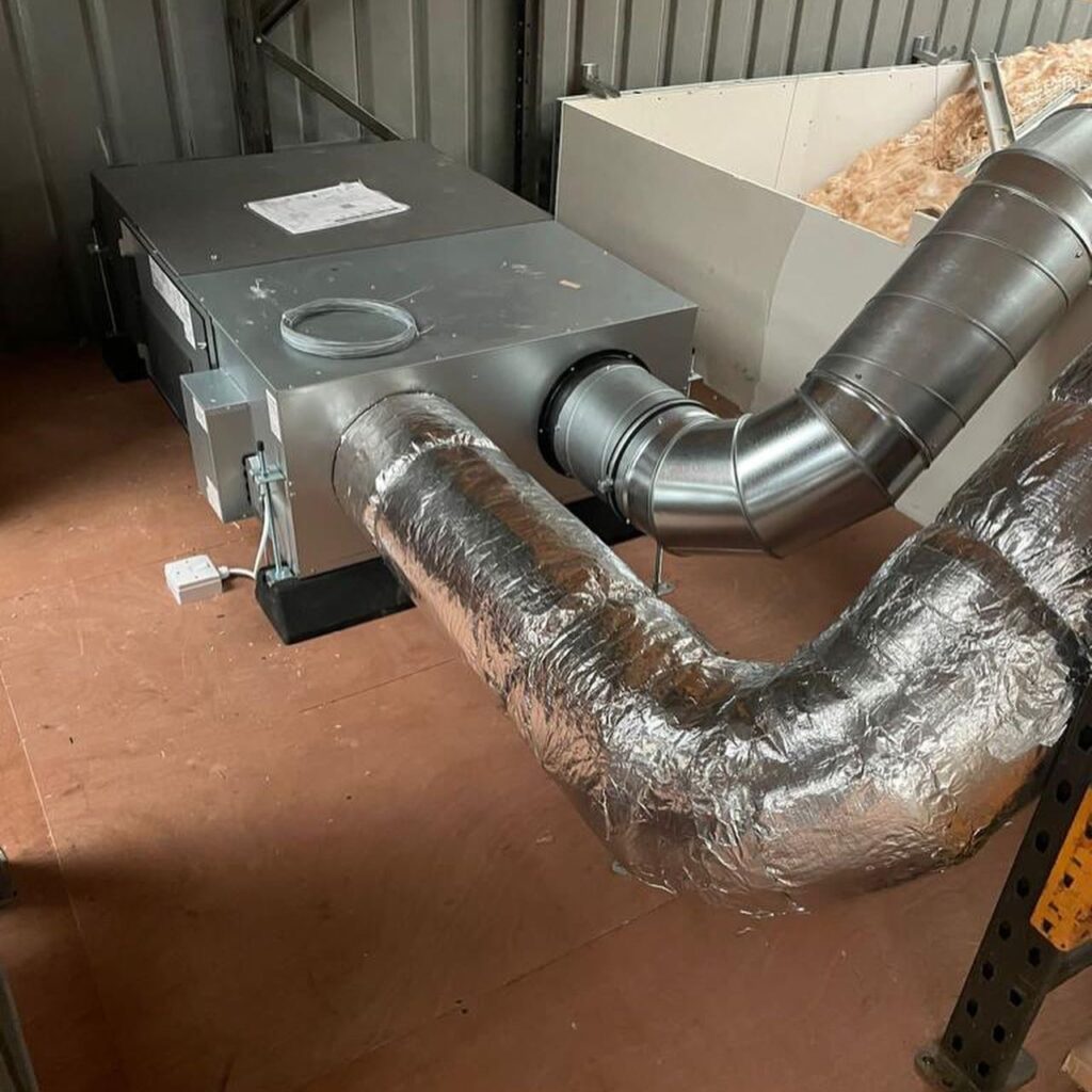 Air conditioning pipes leading to box in the attic